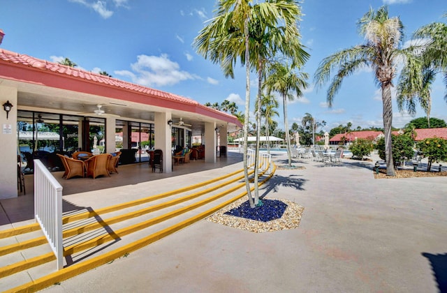 surrounding community featuring a patio