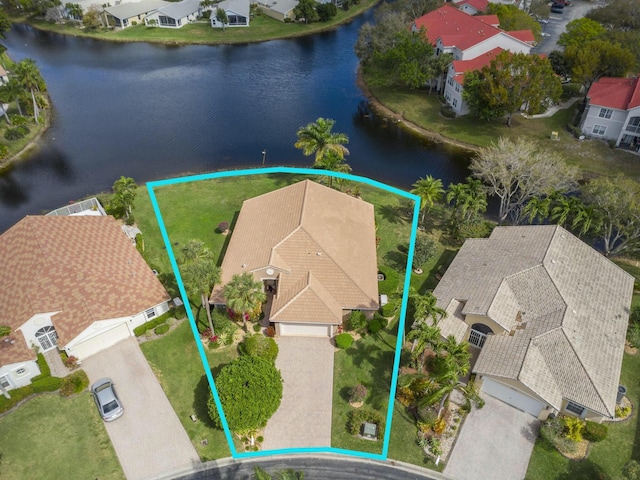 birds eye view of property featuring a water view