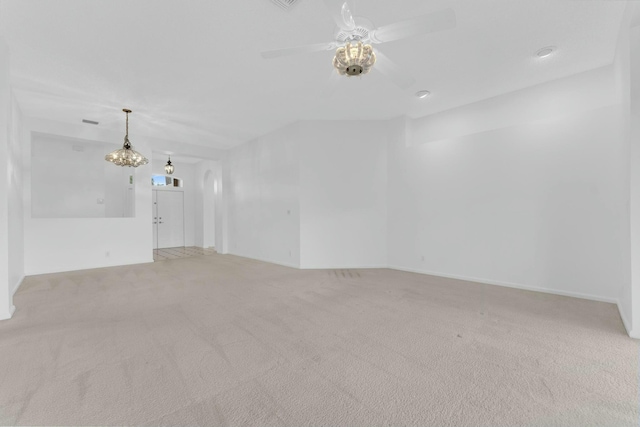 unfurnished room featuring carpet and ceiling fan