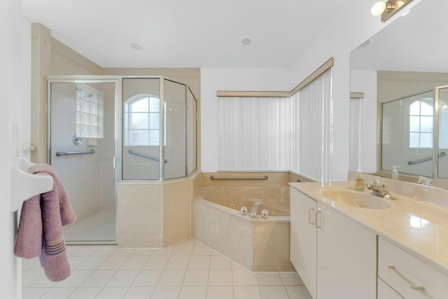 bathroom featuring vanity, separate shower and tub, and tile patterned flooring