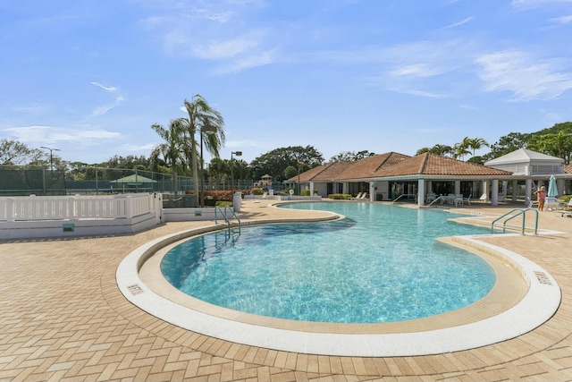 view of pool featuring a patio area