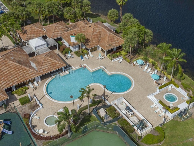 view of pool featuring a water view