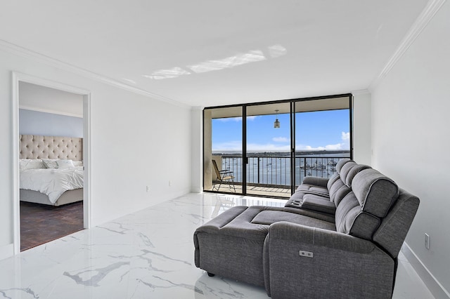 living room with a water view, a wall of windows, and crown molding