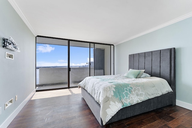 bedroom featuring a wall of windows, ornamental molding, access to exterior, and hardwood / wood-style floors