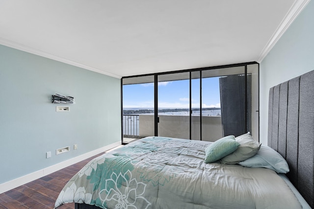 bedroom with dark hardwood / wood-style floors, expansive windows, access to exterior, crown molding, and a water view