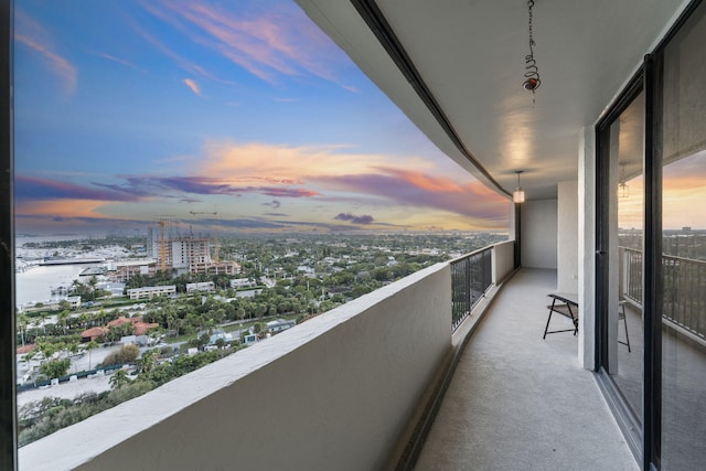 view of balcony at dusk