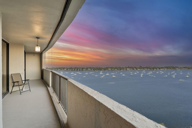 balcony at dusk with a water view