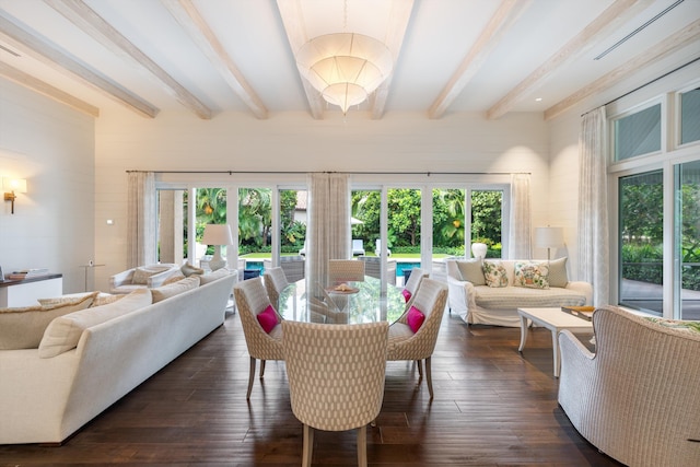 dining area featuring beamed ceiling, dark hardwood / wood-style floors, and french doors