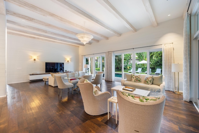 living room featuring dark wood-type flooring, french doors, and beamed ceiling