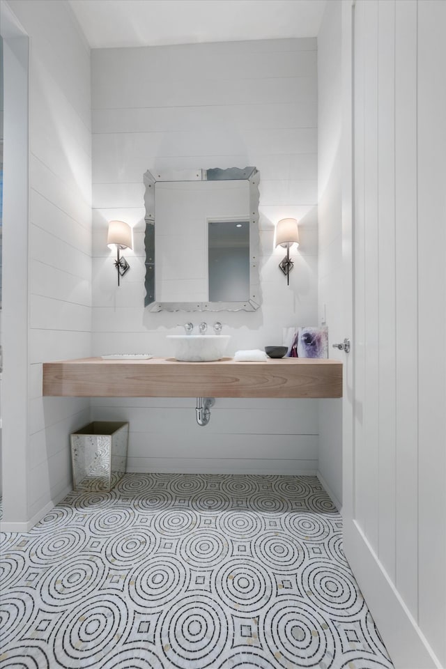 bathroom with tile patterned floors and sink