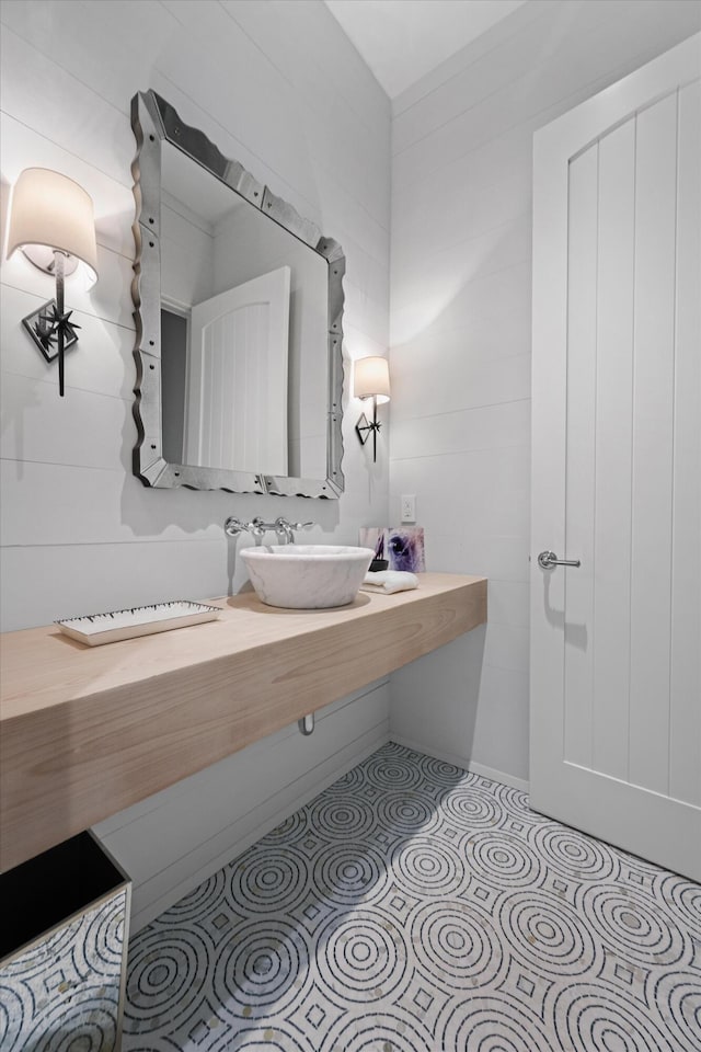 bathroom featuring sink and tile patterned flooring