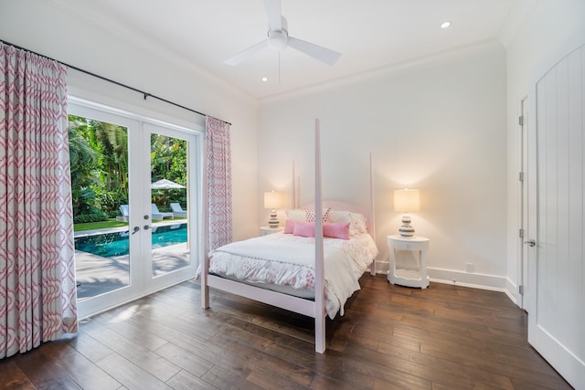 bedroom with dark wood-type flooring, ceiling fan, access to exterior, ornamental molding, and french doors