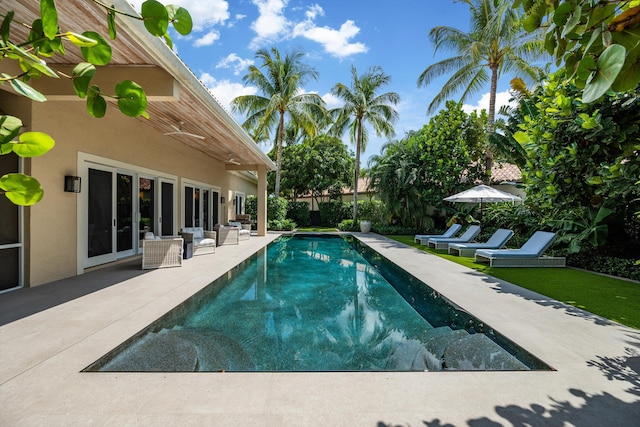 view of pool featuring a patio area