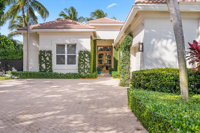 doorway to property featuring french doors