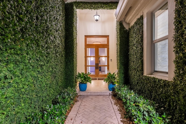 property entrance featuring french doors