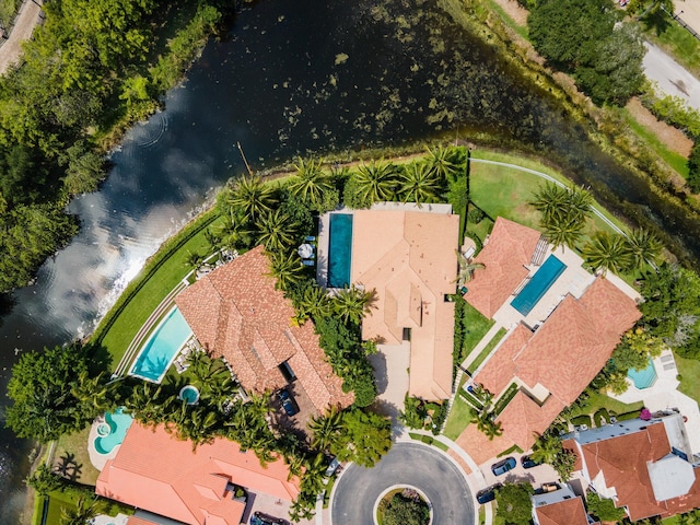 bird's eye view with a water view