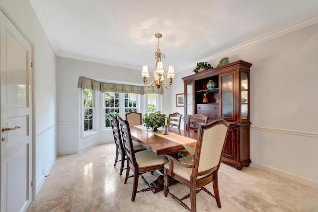 dining area with a notable chandelier and crown molding