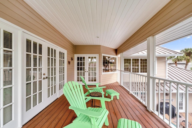 wooden terrace featuring french doors