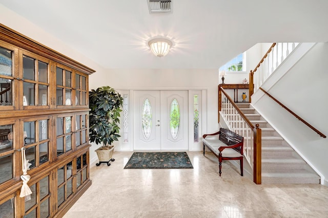 foyer entrance with a healthy amount of sunlight