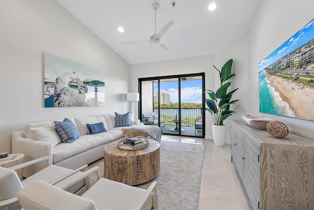 living room featuring high vaulted ceiling, ceiling fan, and light tile patterned flooring