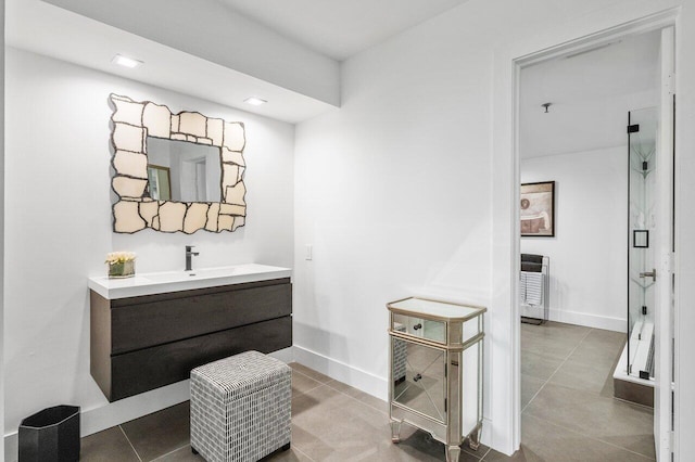 bathroom featuring vanity and tile patterned flooring