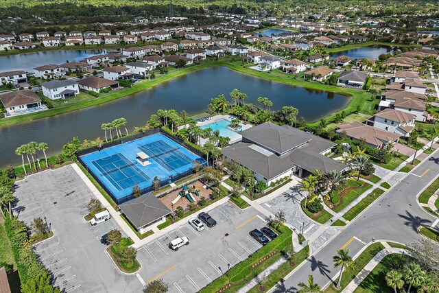 3134 Streng Ln, Royal Palm Beach, FL 33411 - mediterranean / spanish house with stone siding, decorative driveway, stucco siding, and a tiled roof