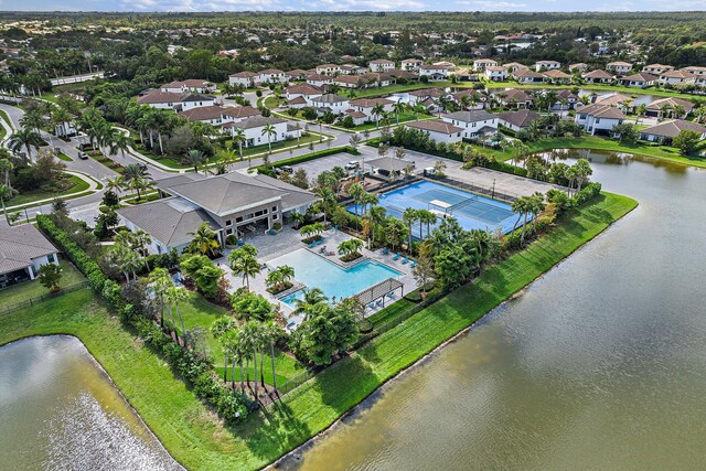 3134 Streng Ln, Royal Palm Beach, FL 33411 - aerial perspective of suburban area with a nearby body of water