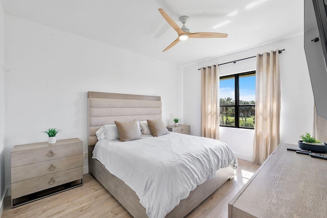 bedroom featuring ceiling fan and light wood-type flooring