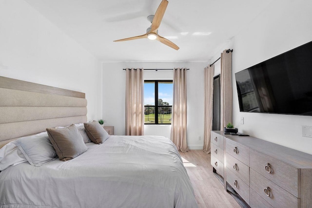 bedroom featuring ceiling fan and light hardwood / wood-style floors