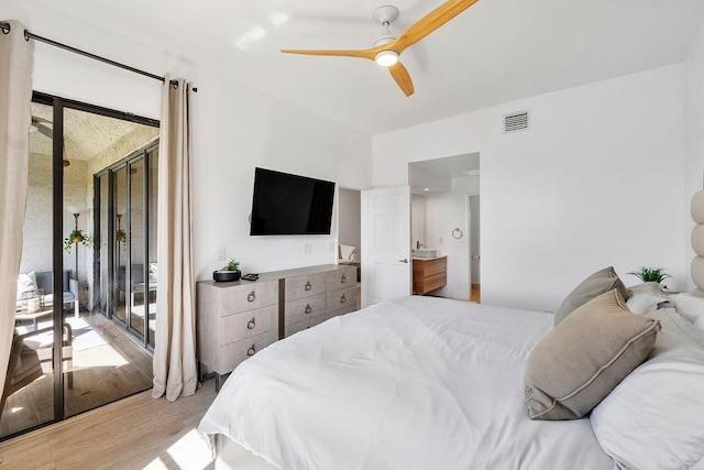 bedroom with multiple windows, ceiling fan, access to exterior, and light hardwood / wood-style floors