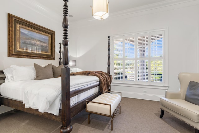 carpeted bedroom with ornamental molding