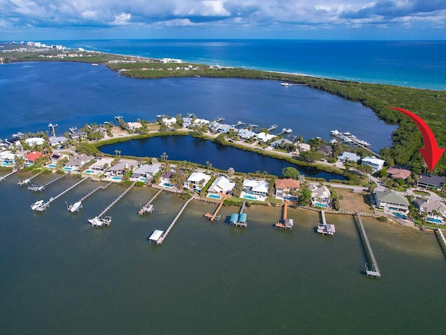 aerial view featuring a water view