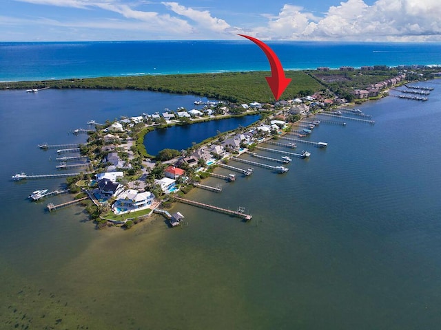 drone / aerial view featuring a water view