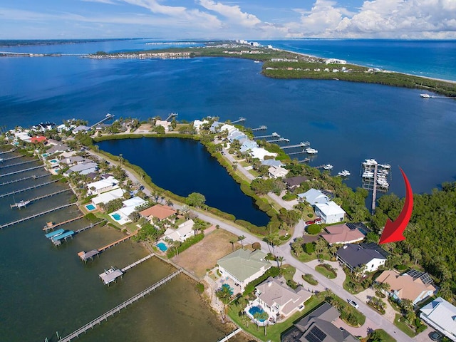 bird's eye view with a water view