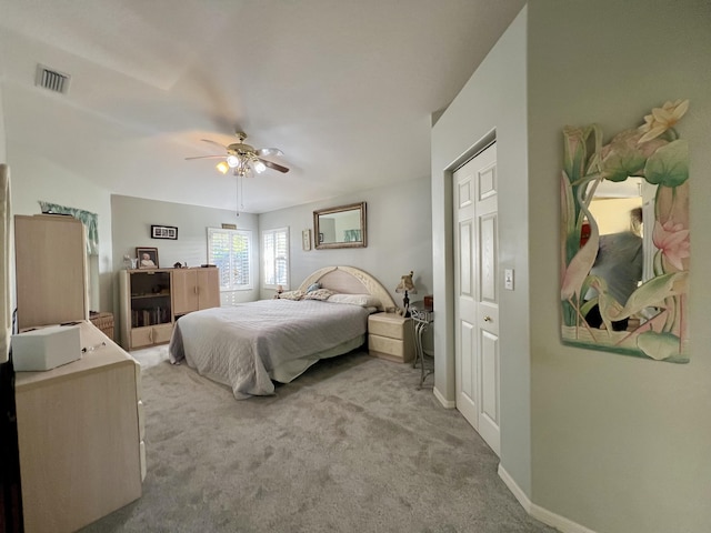 carpeted bedroom with ceiling fan