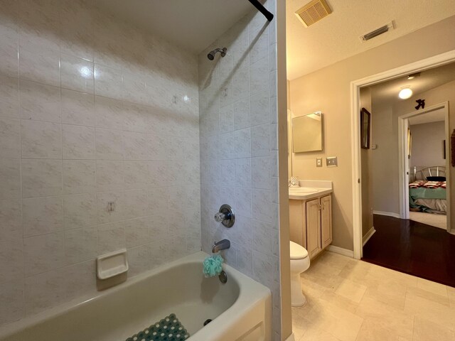 empty room featuring ceiling fan, carpet floors, and a textured ceiling