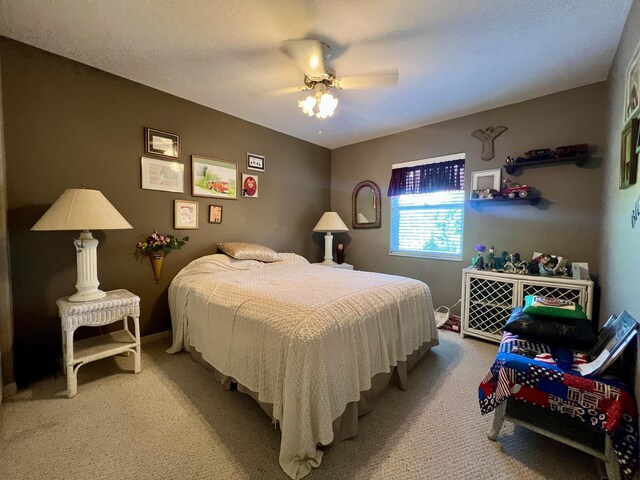 full bathroom featuring shower / tub combo with curtain, vanity, toilet, and a textured ceiling