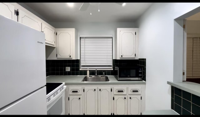 kitchen featuring sink, white cabinetry, ceiling fan, white appliances, and decorative backsplash