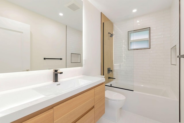 full bathroom featuring vanity, tile patterned flooring, visible vents, toilet, and shower / bath combination