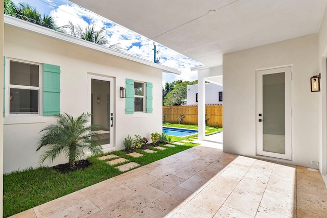 view of patio with fence