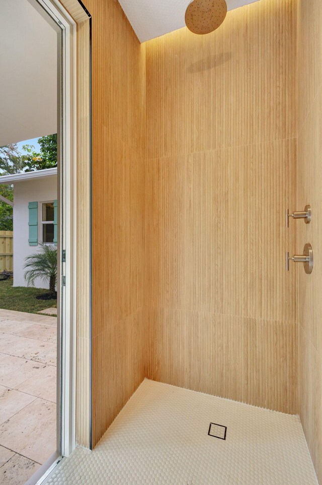 interior space with a tile shower