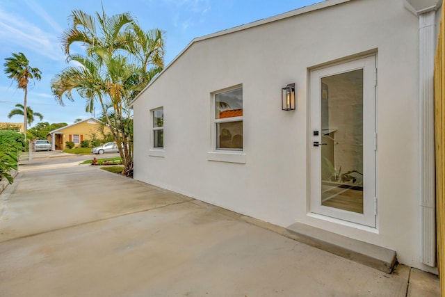 view of property exterior with stucco siding