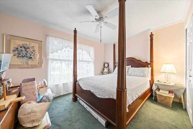 carpeted bedroom featuring ceiling fan, ornamental molding, and a textured ceiling