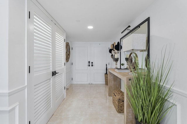 doorway to outside featuring light tile patterned floors