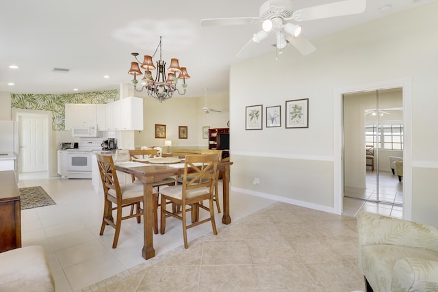 dining space featuring ceiling fan and light tile patterned flooring