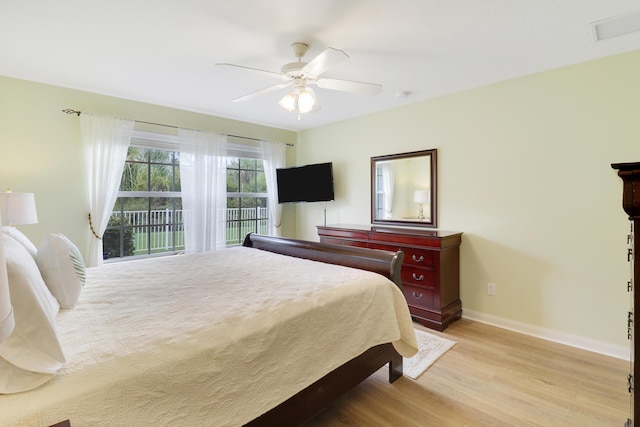 bedroom featuring light hardwood / wood-style flooring and ceiling fan