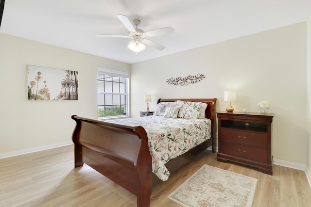 bedroom featuring ceiling fan and light hardwood / wood-style floors