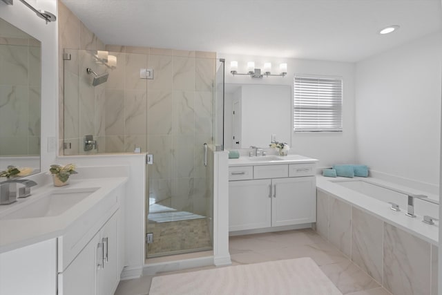 bathroom with plus walk in shower and vanity