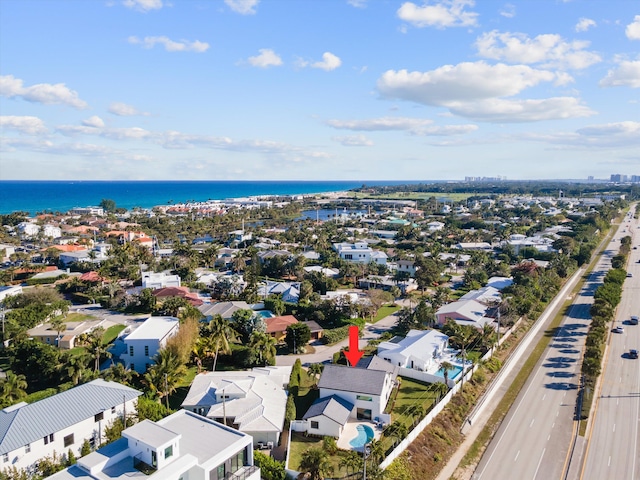 drone / aerial view featuring a water view