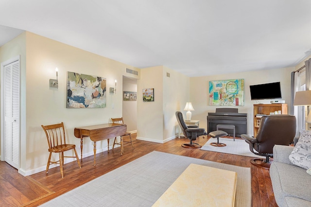 living room with wood-type flooring